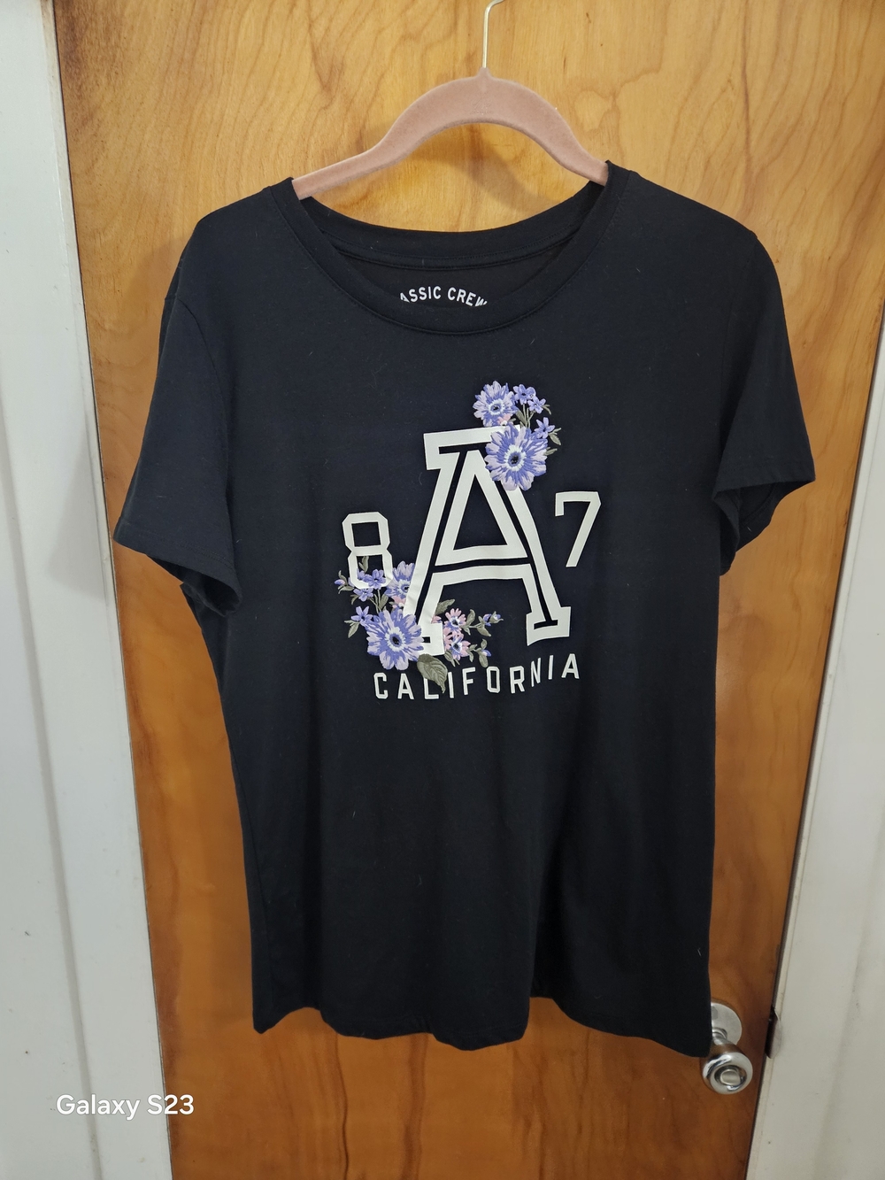 Aeropostale Black Short-Sleeve Graphic Tee with Purple Floral Accent .